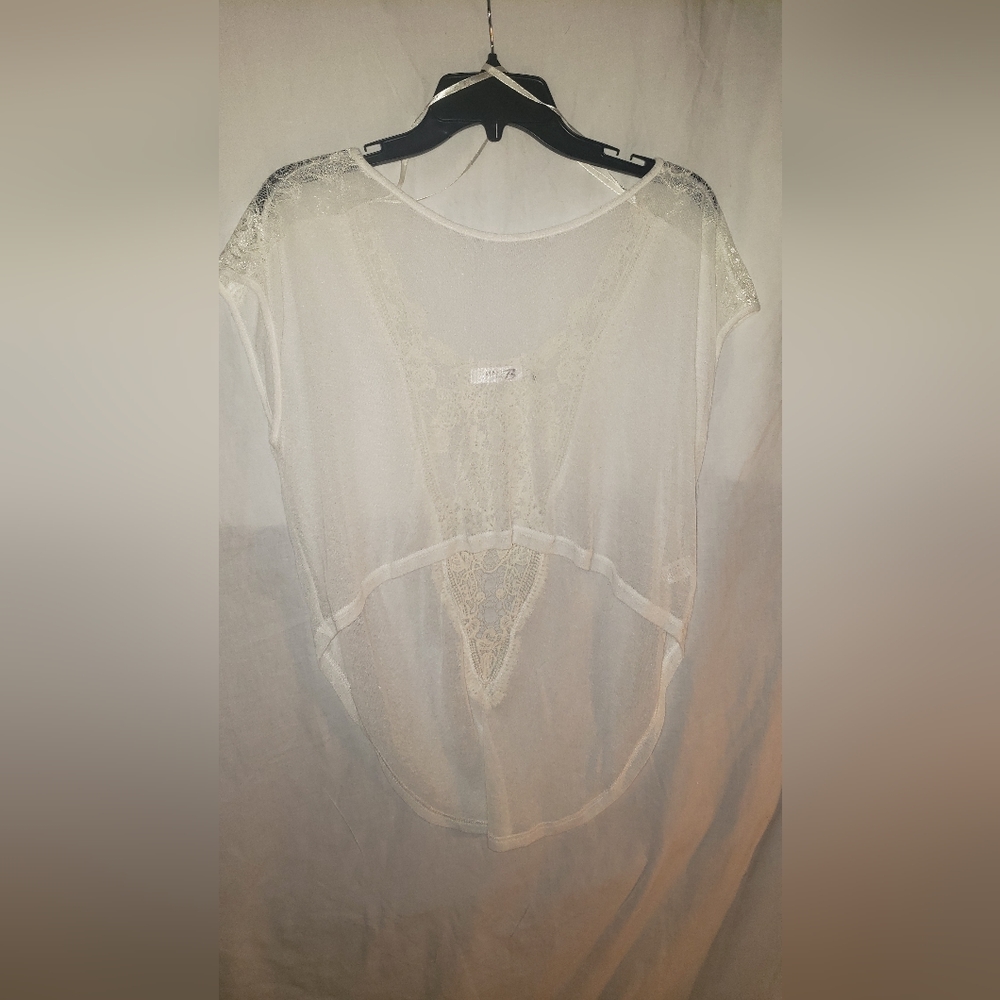 Mak B white top
